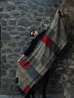 Brunt Red, Rust, Beige and Black are the colours in this unique handcrafted scarf. The body has elaborate motifs of the Ginkgo tree, which is known to bring luck and is also a symbol of love. The leaves are subtly drawn in red clay against the deep orange background. The motif is combined with a graphic edge in black. The border in black though subtle makes the scarf truly stand out and can be used as an exclusive evening wrap to pop up any attire. Crafted out of high-quality Tussar silk, this classic scarf is smart and sophisticated. The black border highlights the rusty red body. The warm colours make it a perfect accessory to complement a range of different colour outfits. The beautiful texture allows you to drape it in multiple styles and give the scarf your signature look.This scarf i Luxury Festive Raw Silk Scarf, Luxury Traditional Raw Silk Scarf, Pashmina Wrap, Thoughtful Christmas Gifts, Flexible Working, Face Light, Pashmina Shawl, Block Printing, Inception