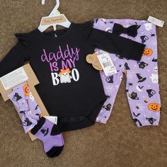 New With Tags ~ Never Worn Baby Girls Baby Essentials 4 Pc Halloween Outfit- "Daddy Is My Boo!" Long Sleeve Shirt, Leggings, Headband, And Socks Set Size 3 Months, 6 Months, 9 Months Product Features Shirt-- Glitter Printed, Appliqued & Embroidered Graphics, Buttons In Back, Flutter Sleeve, Bow, Snaps Leggings-- Elastic Waistband, Elastic At Ankles Headband-- Knot Bow Socks 60% Cotton, 40% Polyester Machine Wash Cute Black Halloween Sets, Playful Purple Playtime Set, Playful Fitted Purple Sets, Cute Black Sets For Playtime, Playful Purple Long Sleeve Sets, Cute Long Sleeve Purple Sets, Cute Purple Long Sleeve Sets, Cute Black Playwear Sets, Cute Purple Cotton Onesie