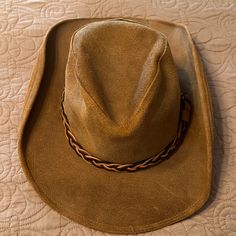 Henschel Hat Co. Outback Leather Hat. Size Large. New With Tags. I Do Think That The Braided Band Could Use Some Glue Towards The Back To Secure It Better. Smoke Free But Pet Friendly Home. Vintage Leather Hat With Short Brim, Vintage Leather Brimmed Hat, Adjustable Vintage Leather Hat, Brown Leather Wide Brim Hat, Adjustable Leather Fedora, Leather Fedora Hats For Rodeo, Brown Leather Fedora, Vintage Wide Brim Travel Hat, Casual Leather Fedora For Rodeo