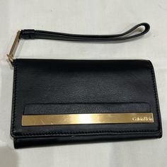 Nwot Calvin Klein Wristlet In Black With Gold Accents. Black Rectangular Wristlet For Gift, Rectangular Black Wristlet For Gift, Rectangular Black Wristlet As A Gift, Black Wallet With Wrist Strap For Gift, Black Wallet With Wrist Strap As Gift, Black Travel Wristlet With Wrist Strap, Black Wristlet With Wrist Strap For Travel, Elegant Black Wristlet With Wrist Strap, Elegant Black Rectangular Wristlet