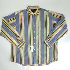 Polo Ralph Lauren Westerton men's button front shirt Size XXLarge Blue, yellow, green, black, orange, red stripe 7 button placket Long sleeves Button cuffs 100% cotton Machine wash, tumble dry New with tags. Original retail price $89.50   Measurements taken with garment laying flat: Chest:  28.5 inches Shoulder to shoulder:  21.25 inches Middle of collar to cuff:  39 inches Top back collar to hem:  36 inches Any questions, please ask.  Shipping Information: I will happily combine shipping if you Casual Striped Button-up Dress Shirt, Striped Button-up Cotton Dress Shirt, Striped Collared Dress Shirt With Button Closure, Classic Multicolor Button-up Shirt, Multicolor Button-up Shirt With Button Cuffs, Striped Cotton Collared Dress Shirt, Red Stripe, Button Front Shirt, Flat Chest