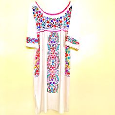 Mexican Dress Traditional, Embroidered Sleeves Boho Chic Flowers Floral, Authentic Vintage Style Dress, Hand Embroidered Handmade Bohemian Style Slow Fashion, Puebla Oaxaca Indigenous Hand Crafted #Mexicandress With Vintage Techniques Made In Mexico Folk Art 100% Cotton Organic Natural Fabric And Thread Pleated And Crochet Details Hand Embroidery Hand Stitched Measurements Shoulders: 18" Bust: Up To 19" Waist: Up To 24" Hip:Up To 27" Lenght: Up To 36" White Resham Embroidery Dress For Festival, Traditional White Embroidered Neckline Dress, White Beach Dress With Resham Embroidery, Traditional White Dress With Floral Embroidery, White Folk Dress With Resham Embroidery, Fitted White Embroidered Dress With Embroidered Border, Fitted White Embroidered Dress With Border, White Fitted Embroidered Dress With Border, White Fitted Embroidered Dress