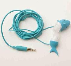 a pair of ear buds connected to a fish shaped headphone cord on a white surface