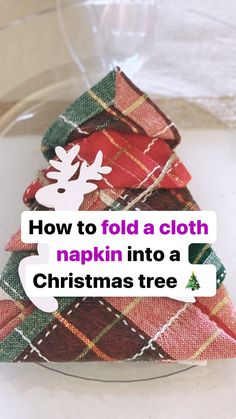 how to fold a cloth napkin into a christmas tree ornament with text overlay