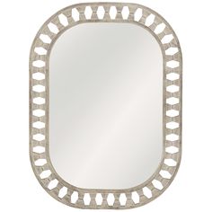 a white mirror with an intricate design on the bottom and sides, against a white background