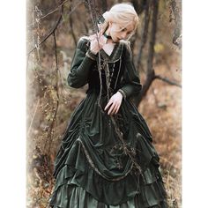 A dress with a geometric embroidery pattern that gives it an exotic feel, a lace-up vest, and a tiered skirt. The long cuffs and fluffy skirt give it an elegant look. Wearing a tiered skirt under your dress will add to your beautiful silhouette. Create a romantic, retro atmosphere. 
 
 

 

 
 
 ＜Item＞ 
 
 One piece (*with choker) 
 Best 
 Skirt 
 
 
 ＜Size＞ 
 
 One Piece 
 
 S size 
 
 Length: 120cm 
 Upper body length: 38cm 
 Waist: 65cm (*Recommended: 56-72cm) 
 
 Sleeve length: 66cm 
 
 L si Spring Costume Party Dress With Tiered Skirt, Fitted Vintage Dress With Ruffles For Costume, Fall Fitted Victorian Dress With Ruffles, Fall Victorian Dress For Wedding, Fall Victorian Wedding Dress, Victorian Dress With Ruffles For Winter Costume, Fall Costume Dresses With Ruffles, Vintage Ruffled Dress For Fancy Dress Events, Fitted Green Victorian Dress With Ruffles