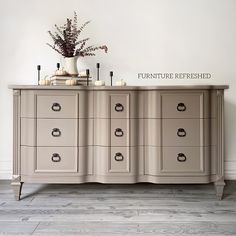 an antique dresser with drawers and candles on top is featured against a white wall that reads furniture refreshed