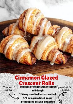 cinnamon glazed crescent rolls on a wooden platter