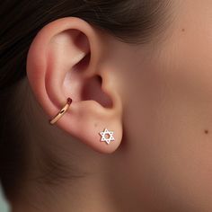 Each pair of Star of David Earrings features the iconic six-pointed star, rich in religious and cultural significance. Whether you choose gold filled, sterling silver, or rose gold filled, these earrings are a tribute to faith, tradition, and the enduring beauty of the Star of David. ✡️  * We use the Highest Quality materials from the US and Italy. * Your purchase will come packaged and ready for gift giving!  M A K E S * A * P E R F E C T * G I F T : ) * * * * * * * * * * * * * * * * * * * * * * * * * D E T A I L S * 10mm x 8.7mm Star of David * 14K gold filled, 14K rose gold filled or sterling silver stud earrings * * * * * * * * * * * * * * * * * * * * * * * * * H O W * T O * O R D E R 1st DROP DOWN choose your metal * * * * * * * * * * * * * * * * * * * * * * * * P A C K A G I N G If t Star Of David Earrings, Star Earring, Jewish Star, Silver Monogram, Earring Gold, Wishful Thinking, Monogram Necklace, Earrings Dainty, Jewelry Card