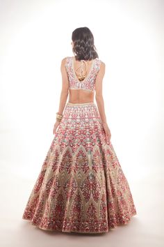 Ivory organza lehenga with fine multi-hued resham embroidery with a touch of sequins and glass beads paired with a matching blouse and organza dupatta with embroidered cutwork borderFrom Chamee and Palak 's The Wedding Edit collectionDELIVERY TIMEPlease allow 8-12 weeks for your outfit to arrive.FABRIC DETAILSOrganza and Raw silkProfessional cleaning only. Red Floral Embroidered Anarkali Set For Wedding, Organza Choli With Cutdana For Reception, Tissue Silk Choli With Floral Embroidery For Reception, Reception Organza Choli With Cutdana, Art Silk Gown With Floral Embroidery For Wedding, Reception Floral Embroidered Raw Silk Choli, Wedding Gown With Floral Embroidery In Art Silk, Chanderi Choli With Floral Embroidery For Reception, Tissue Silk Lehenga With Floral Embroidery For Reception