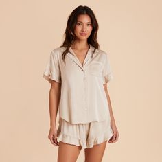 Discover the ultra-comfy short sleeve pajama set, complete with a ruffle trim and available in Neutral Champagne. Shop now at Birdy Grey. This ruffled PJ set is the perfect getting ready look, with a flirty, feminine twist. | Neutral Champagne Getting Ready Size 2X | Birdy Grey Esther Ruffled Short Sleeve Pajama Set Wedding Pajamas Winter, Pajamas For Bridal Party, Unique Bridal Party Getting Ready Outfits, Bridesmaid Pajamas Wedding Day, Getting Ready Outfits For Bridesmaids, Bridal Party Getting Ready Outfit, Wedding Getting Ready Outfit, Bridesmaid Getting Ready Outfit, Bride Getting Ready Outfit