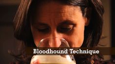 a woman drinking from a wine glass with the words bloodhound technique on it