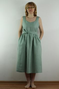 "Handmade minty green linen dress sleeveless, with 2 pockets, belt, perfect for casual wear and suitable for any occasion in summer season Details: - 100% natural linen produced in Europe ; - medium weight (180 gram per square meter); - color: could be any from our colors catalogue (color samples at the photo); Made to order, approximately a few days, If you have any questions please message me and I will be glad to answer. Size guide : Size XS Bust: fits bust around 33\"-34\"/ 84-88 cm Waist: f Green Cotton Midi-length Sleeveless Dress, Green Cotton Midi Length Sleeveless Dress, Green Cotton Sleeveless Midi Dress, Sleeveless Light Green Maxi Dress For Summer, Light Green Sleeveless Maxi Dress For Summer, Sleeveless Light Green Midi Dress, Green Cotton Sleeveless Summer Dress, Green Cotton Summer Sleeveless Dress, Casual Light Green Sleeveless Dress