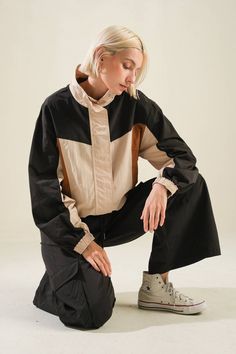 A woven color block windbreaker Details: Self: 100% NylonContrast 1: 100% NylonContrast 2: 100% Nylon Size & Fit - Model is 5`8" And Wearing Size Small- Measurements Taken From Size Small- Approx. Length: 24" Colorblock Windbreaker, French Collection, Clare V., Woven Jacket, Black Camel, Forever Jewelry, Resort Collection, Autumn Season