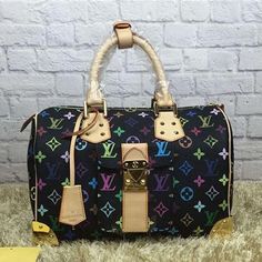 ® Description: This Speedy city bag comes in refreshing Monogram Multicolore canvas. Features the Louis Vuitton signature in 33 different colours for a bright yet sophisticated look. Size: 11.8 x 8.3 x 6.7 inches / 30cm x 21cm x 17cm (Length x Height x Width) Detailed Features: – Iconic Louis Vuitton Speedy shape – Flexible ... Designer Multicolor Satchel For Travel, Louis Vuitton Pallas, Louis Vuitton Speedy 35, Louis Vuitton Speedy 25, Limited Edition Bag, Louis Vuitton Wallet Zippy, Louis Vuitton Speedy 30, Cheap Handbags, Speedy 30