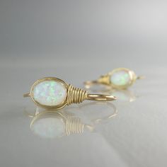 Gold Filled Opal Earrings Oval Opal Earrings White by yifatbareket White Oval Earrings With Ear Wire, Oval White Wire Wrapped Jewelry, Opal Earrings Dangle, Blue Opal Earrings, White Opal Earrings, Opal Drop Earrings, Jewelry Opal, White Lab, Ringe Gold