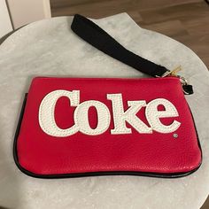 Adorable And Perfect For Those Coca Cola Lovers!! Casual Clutch Wristlet For Daily Use, Casual Wristlet Clutch For Daily Use, Casual Everyday Clutch Wristlet, Trendy Red Wristlet For Everyday Use, Trendy Red Pouch, Red Trendy Wristlet For Everyday Use, Coke Products, Coca Cola Glass, Coca Cola 2l