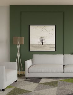 a living room with green walls and white furniture