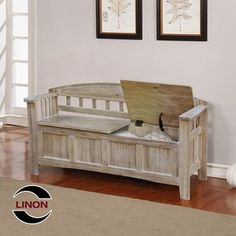 a wooden bench sitting on top of a hard wood floor