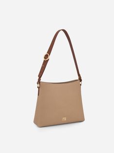 The Carrie hobo is designed with a wide and adjustable leather strap and a zip closure for maximum lightness, flexibility, and safety. The bag is lined with smooth leather and has seven slip pockets. It can fit up to a 10.2" iPad and essentials, making it the perfect everyday bag. Optional Add-ons: Webbing Shoulder Strap; AirPods Pro Case. Versatile Leather Baguette Bag With Leather Handles, Versatile Formal Hobo Bag With Gold-tone Hardware, Versatile Leather Hobo Bag With Leather Handles, Versatile Hobo Bag With Gold-tone Hardware For Work, Versatile Hobo Bag With Gold-tone Hardware, Everyday Leather Baguette Bag With Detachable Strap, Leather Baguette Bag With Detachable Strap For Everyday, Versatile Hobo Bag Tote With Gold-tone Hardware, Versatile Hobo Shoulder Bag With Gold-tone Hardware