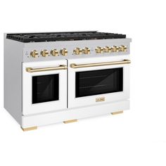 a white and gold stove with two ovens