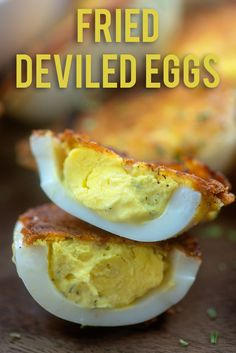 two deviled eggs stacked on top of each other with the words fried deviled eggs