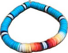 Southwestern Style Blue Bracelets For Beach, Colorful Beaded Southwestern Bracelets For Beach, Southwestern Style Blue Beaded Bracelets For Beach, Beaded Southwestern Bracelets For Beach, Southwestern Beaded Bracelets For Beach, Bohemian Rainbow Stretch Bracelet For Beach, Southwestern Style Beach Bracelets With Round Beads, Southwestern Hand-strung Beaded Bracelets For Beach, Southwestern Hand-strung Beaded Bracelet For Beach