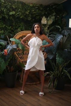 Elevate your summer beach style with ease in our TROPICANA two-piece summer set, crafted from breathable muslin fabric. This ensemble comprises a sleeveless top and a mini or midi skirt, offering both versatility and charm. Wear them separately for endless mixing and matching possibilities, or effortlessly tie them together to create the illusion of a stunning dress. Embrace the sunny vibes with this ensemble that effortlessly fuses comfort and style, making it an ideal choice for your summer be Spring Breezy Linen Sundress, Breezy Sundress For Summer Beach Party, Chic Sundress For Beach Party In Summer, Chic Sundress For Summer Beach Party, Spring Linen Sundress For Vacation, Chic Linen Sundress For Summer, Cotton Beach Dress For A Summer Day Out, Cotton Beach Dress For Summer Outings, Chic Linen Beach Dress For Spring