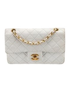 Chanel Shoulder BagBy Karl LagerfeldWhite LeatherInterlocking CC Logo & Quilted PatternGold-Tone HardwareChain-Link Shoulder StrapSingle Exterior PocketLeather Lining & Four Interior PocketsTurn-Lock Closure at FrontUnfortunately, due to restrictions, this item may not be eligible for shipping in all areas. 90s Chanel, Authenticity Certificate, Shopping Chanel, White Quilt, Mini Handbags, Mens Jewelry Bracelet, Chain Shoulder Bag, Vintage Chanel, Classic Flap