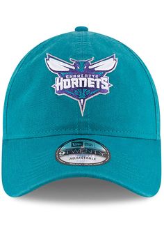 This Charlotte Hornets Teal Adjustable Hat features a front embroidered team logo on a lightly-structured cotton crown, with pre-curved visor and adjustable backstrap. Team logo embroidered on the front, Cloth Strap Closure to dial in the perfect fit, Relaxed, unstructured fit, Pre-curved bill, 100% cotton construction, New Era Flag logo on side, Dad hat, 100% Cotton, Washable, Imported Cotton Hat With Team Logo For Sports Events, Cotton Sports Hat With Team Logo, Cotton Sports Hat With Embroidered Logo, Team-colored Cotton Hats With Curved Brim, Team-colored Cotton Hat With Embroidered Logo, Cotton Fan Merchandise Cap, Cotton Cap For Fan Merchandise, Team-colored Cotton Hats For Sports, Team-colored Cotton Sports Hats