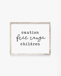 a black and white print with the words caution free range children in cursive font