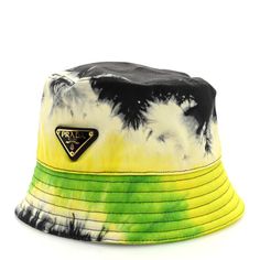 This is an authentic PRADA Used Denim Tie Dye Metal Triangle Logo Womens Bucket Hat size S in Black and Lime. This stylish bucket hat is crafted of denim multicolor fabric with a black and gold Prada logo at the front and black fabric lining. Designer Summer Hats With Short Brim, Designer Summer Hat With Short Brim, Designer Short Brim Summer Hat, Trendy Bucket Hats For Spring, Trendy Multicolor Flat Brim Sun Hat, Designer Beach Hats For Spring, Designer Spring Bucket Hat With Short Brim, Designer Short Brim Bucket Hat For Summer, Multicolor Flat Brim Bucket Hat For Summer