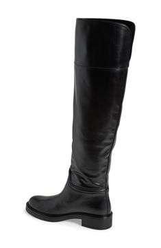 A classic riding boot takes a dramatic turn with smooth leather composition and an over-the-knee silhouette. 1 3/4" heel 20 1/2" shaft; 14" calf circumference Pull-on style Leather upper/synthetic lining and sole Made in Spain Classic Wide Calf Knee-high Boots For Riding, Classic Knee-high Boots In Calf Leather, Classic Wide Calf Knee-high Boots In Calf Leather, Leather Knee-high Riding Boots, Classic Riding Knee-high Boots Medium Width, Classic Calf Leather Wide Calf Knee-high Boots, Elegant Wide Calf Knee-high Riding Boots, Elegant Wide Calf Knee-high Boots For Riding, Elegant Knee-high Riding Boots