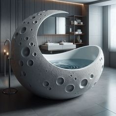 a bathtub shaped like the moon with holes in it's side and inside