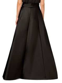 Versatile and beautiful, this evening skirt will refresh all of your formal events. This ball skirt features a self-tie waist, pockets, and a high low hem. Crafted from silky taffeta, this ball gown skirt shines no matter the occasion. A zip up back finishes off the design. Pair this evening separate with your favorite tops to create the ball gown of your dreams. Ball Skirt, Work Wear Outfits, Gown Skirt, Petite Jumpsuit, Occasion Dresses Wedding, Ball Gown Skirt, Petite Coat, Puff Sleeve Dresses, Tshirt Skirt