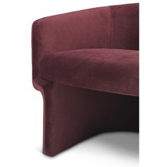 the curved couch is made out of fabric and has a dark red finish on it