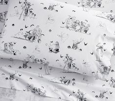 the bedding is white and has black drawings on it