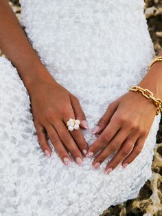 The Pearl Cluster Ring is the best in show! Handmade with multiple sizes of freshwater pearls that cluster perfectly together! When thread you move your hand, you’ll hear the delicate sound of pearls adjusting on your finger. Such a beautiful statement ring all you need is fun statement Earrings like Pearl Earrings, or any necklace with pearls to complete this look. Size: Adjustable White Pearl Ring With Pearl Chain, Pearl Ring For Wedding, White Open Ring For Party, White Beaded Pearl Ring, Pearl Ring For Party, White Beaded Wedding Rings, Party Pearl Ring Jewelry, Elegant Beaded Wedding Rings, Elegant Beaded Rings For Party