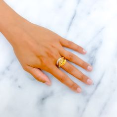 This Intricate Matte Finish Ring is a stunning statement piece crafted with 22k yellow and white gold. With an impressive weight of 5.1g, this ring exudes luxury and style. Available in size 9.25 with resizing options. The intricate detailing and unique matte finish make this accessory stand out. Elevate your fashion game with this exquisite and versatile accessory. Product Details Gold Purity(karat): 22k Gold Weight(grams): 5.1 Item Finish: Yellow + White Gold Ring Size: 9.25 Ring Sizing Availa Elegant 22k Gold Diamond Ring For Anniversary, Elegant 22k Gold Diamond Ring, Elegant 22k Gold Engraved Ring Hallmarked, Luxury 22k Gold Ring For Anniversary, Luxury Gold Snake Ring With Polished Finish, Elegant Gold Snake Ring With Polished Finish, Elegant Gold Polished Finish Snake Ring, Exquisite Gold Diamond Cut Rings, Elegant 22k Gold Ring With Polished Finish