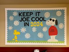 a poster on the wall that says keep it joe cool in 2012 with a dog and snowflakes