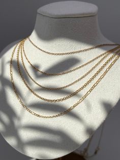 "14k Chain Necklace Cable Oval Round/Box/Twisted Singapore /Fancy Twisted Solid/Figaro Yellow Gold (16\"-22\") Introducing a luxurious addition to any jewelry collection - the 14k Gold Chain Necklace Cable Oval/Box/Twisted Singapore /Fancy Twisted Solid/Figaro Yellow Gold. Crafted from the finest real 14k gold, this exquisite chain will add a touch of elegance to any ensemble, and effortlessly transition from day to night with ease. With sizes ranging from 16\" to 22\", this timeless piece is pe 14k Gold Chain Necklace With Oval Pendant For Gift, Gift 14k Gold Chain Necklace With Oval Pendant, Gold Chain Necklace With Tarnish Resistant Oval Pendant, Gold Chain Necklace With Oval Pendant, Tarnish Resistant, Gold Oval Pendant Chain Necklace, Tarnish Resistant, Classic Necklaces With Delicate Oval Chain, Gold Oval Necklaces In Fine Jewelry Style, Classic Gold Necklace With Oval Pendant, Classic Oval Necklaces With Delicate Chain