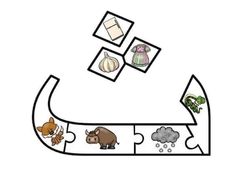 an animal puzzle is shown with animals and other things on the board, including letters