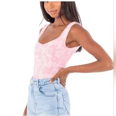 Bring Some Flair To Your Wardrobe With This Free People Clean Lines Bodysuit In Bubble Bath Combo. With A Comfortable Fit, This Medium-Large Tank Is Perfect For Casual Occasions. The White-Pink Color Combination And Basic Style Make This Bodysuit A Versatile Addition To Your Collection. Made From Polyester, Spandex And Nylon, This Lined Bodysuit Is Both Durable And Stylish. The Free People Brand Adds A Touch Of Sophistication To This Piece. Whether You're Dressing Up Or Down, This Bodysuit Is Su Spring Pink Seamless Bodysuit, Pink Seamless Bodysuit For Spring, Casual Scoop Neck Summer Bodysuit, Casual Scoop Neck Bodysuit For Spring, Casual One-piece Top For Summer, Casual One-piece Tops For Spring, Summer Pink Bodysuit With Scoop Neck, Pink Color Combination, Free People Romper