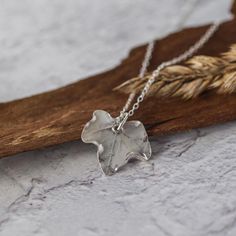 Handmade silver baby Ivy leaf Pendant on a delicate sterling silver trace chain.  This cute Silver Leaf Necklace is made by hand from a real leaf using '999' fine silver. This would make the perfect Christmas gift for a nature lover & is eco friendly too as Fine Silver is a recycled material. Ivy symbolises eternity, fidelity, and strong affectionate attachment, so would make the perfect gift for a loved one! Pendant length 1.5cm & is supplied on a sterling silver trace chain, please choose whic Handmade Sterling Silver Leaf-shaped Necklace, Delicate Handmade Sterling Silver Charm Necklace, Delicate Handmade Silver Charm Necklaces, Silver Leaf-shaped Necklaces For Gift, Silver Leaf-shaped Necklace Gift, Silver Leaf-shaped Necklace For Gift, Everyday Sterling Silver Leaf Jewelry, Sterling Silver Leaf-shaped Jewelry Gift, Handmade Sterling Silver Leaf Necklace