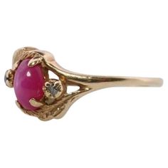 Vintage from the 1950s Materials: White gold Gemstone: Ruby Gem color: Pink Band color: Gold Style: Art nouveau The star is seen in light and follows the light source. Pictures do not do this gem justice. Condition: Ring shows little to no visible wear. Details: 10k Yellow Gold 1.5 grams Total Weight 4mm by 6mm star ruby cabochon Size 6 Ruby Solitaire Ring, Sapphire Solitaire Ring, Yellow Sapphire Rings, 10k Gold Ring, Round Sapphire, Gold Solitaire Ring, Sapphire Solitaire, Engagement Sets, Pink Star