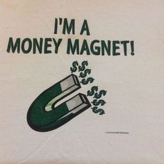 i'm a money magnet t - shirt in white with green writing on the front