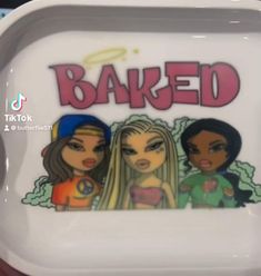 a tray with two girls on it that says baked