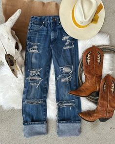 "Super fun vintage distressed  Wrangler blue jeans!  Pair with your Fairview t boots or booties and western tee!  Perfectly distressed and faded  100% cotton  Tag reads size 27x34  936DEN style  High waisted  Measurements:  Vintage wranglers tend to run small  Please see measurements  Waist laid flat 13.5\"  Rise 11\"  Hips laid flat 15.5\"  Inseam 32\"  For accurate fit- please compare these measurements with at least 3 pairs of jeans you wear.  No returns  Thank you for looking!" Vintage Ripped Bottoms For Fall, Retro Distressed Jeans For Fall, Vintage Ripped Jeans For Fall, Western Jeans Wrangler, Rugged Medium Wash Jeans For Rodeo, Distressed Wrangler Jeans, Vintage Denim Jeans For Rodeo, Vintage Dark Wash Jeans For Rodeo, Womens Retro Wrangler Jeans