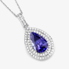 14K White Gold Tanzanite Pendant, Genuine Tanzanite and Diamond Gold Pendant Necklace, Statement Pendant, Bridal Tanzanite Pendant Stunning verdant color beautifies this fundamental symbol of beauty. A glorious halo pendant is adored with genuine pear tanzanite gemstones totaling 2.56 carats. Set in polished 14k white gold with fine finish on a . A truly special piece for yourself or to gift for any festive milestone. , tanzanite pendant halo necklace. 14k gold tanzanite and diamond pendants are Luxury Tanzanite Pear-shaped Jewelry, Dazzling Tanzanite Jewelry, Luxury Pear-shaped Tanzanite Jewelry, Brilliant Cut Tanzanite Necklace For Wedding, Formal Sapphire Necklaces With Accent Stones, Sapphire Necklaces With Accent Stones For Formal Occasions, Tanzanite Pendant For Anniversary, Anniversary Tanzanite Necklace With Brilliant Cut, Tanzanite Pendant Necklace For Anniversary