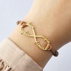 "This dainty handcrafted infinity bracelet represents the special connection between mother and her children. It can be personalized with up to 4 names, making it the perfect and unique gift to your dearest people on any special occasion of the year. ► ENGRAVED CHILDREN NAMES BRACELET * Material: High Quality Solid 925 Sterling Silver * Finishing: Silver, Gold or Rose Gold. * Word limits: up to 6-8 characters for best visibility. * The infinity charm measures approx. 1 3/4\" (42mm) in length and Adjustable Name Bracelet As Gift For Mom, Adjustable Infinity Jewelry Gift For Mom, Adjustable Infinity Jewelry As Gift For Mom, Adjustable Infinity Jewelry For Mother's Day, Personalized Infinity Bracelet As A Gift, Friendship Infinity Bracelets For Mother's Day, Custom Name Infinity Jewelry For Mother's Day, Customized Adjustable Jewelry For Mother's Day, Personalized Adjustable Infinity Jewelry